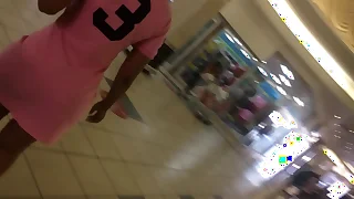 ass under pink skirt on an escalator.MOV